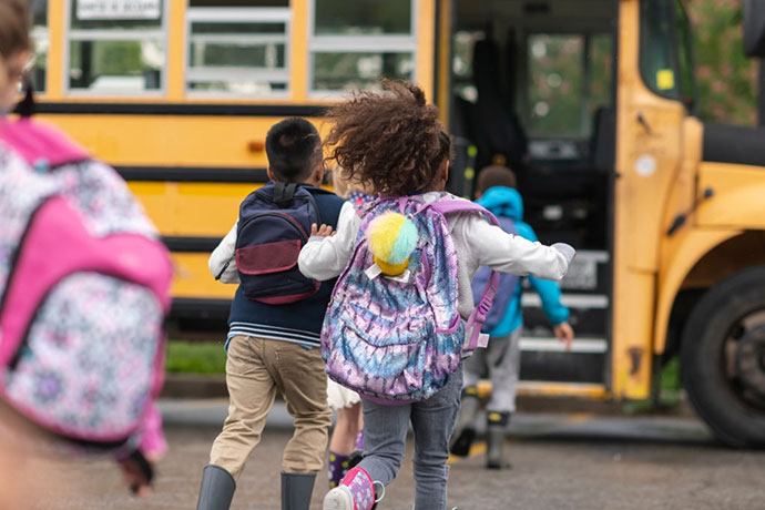 Why should I feel my child is safe riding in a school bus?