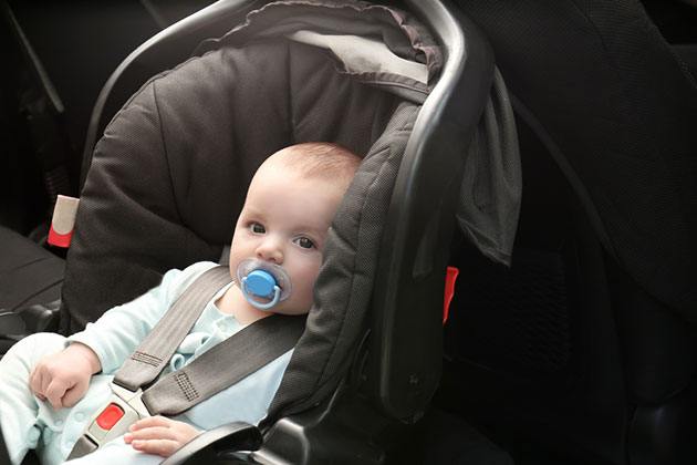 when to turn car seat around